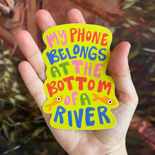 "My phone belongs at the bottom of a river" Sticker
