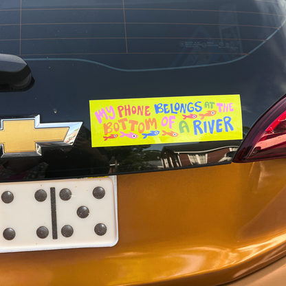 "My phone belongs at the bottom of a river" Bumper Sticker